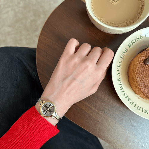 ساعة نسائية حصير باللون الذهبي الفضي ميناء رصاصي