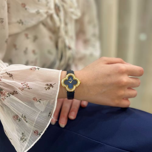 ساعة جلد نسائية بلونها الذهبي الازرق الميناء الازر...