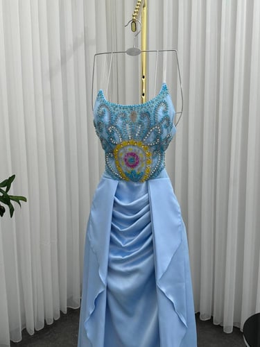 فستان سهره اللون سماوي ناعم القماش تفته استرتش تطر...