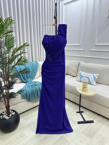 فستان سهره لون يميل للنيلي و الموف الخـامة جورجيت...