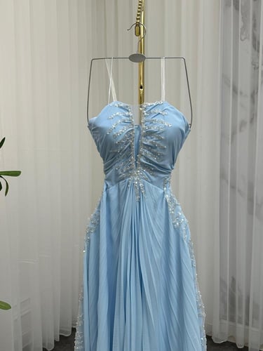 فستان سهره سماوي فخم مزين بتطريز راقي الخامه شيفون...