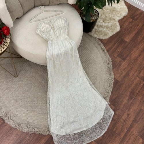 فستان سهره اللون ابيض تل مطرزه بلول وخرز من متجر ج...