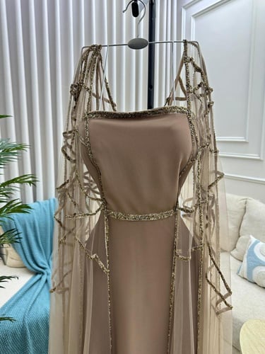 فستان سهره اللون بني الخامه جورجيت تل تيواني تطريز...