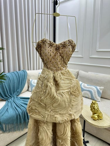 فستامن سهره اللون ذهبي القماش صدريه باربي بطريز يد...