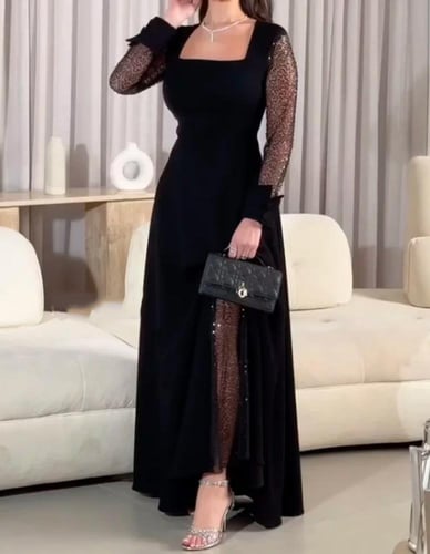 فستان اسود ناعم طويل بأكمام من الترتر و باربي من م...
