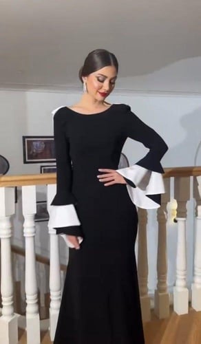 فستان اسود اكمام بيضاء