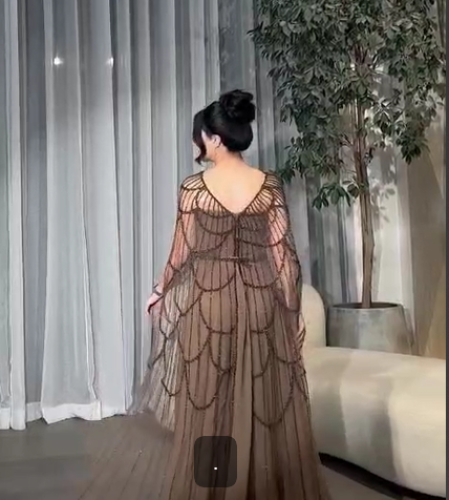 فستان سهره اللون بني الخامه جورجيت تل تيواني تطريز...