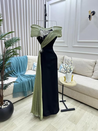 فستان سهره اللون اخضر واصفر نوع القماش باربي . واو...