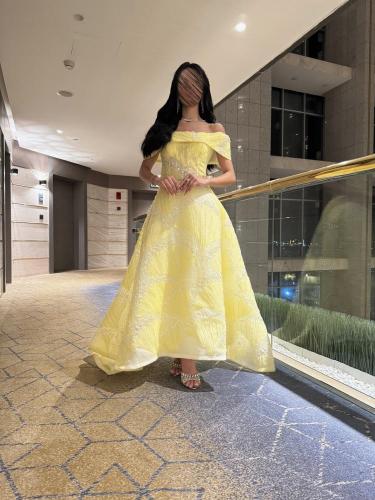 فستان سهره فخم اصفر من متجر جوهره