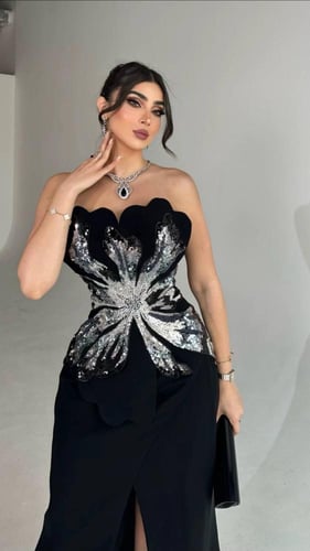 فستان سهره اللون اسود خامه باربي وكلفه خرز شغل يد...