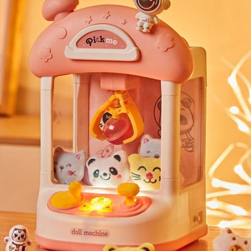 آلة الدمية رائد الفضاء أو آلة توزيع الألعاب باللون...