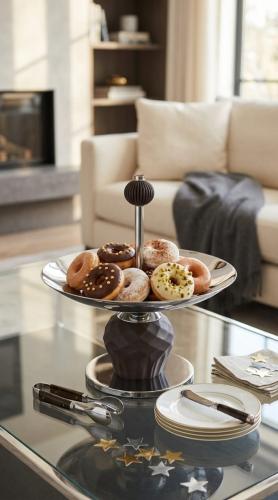 Luxury dessert and fruit serving tray with a raised base, featuring an elegant modern design for hospitality decor and tables