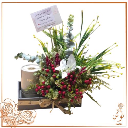 هدية عطر الماجد مع الزهور الصناعيه