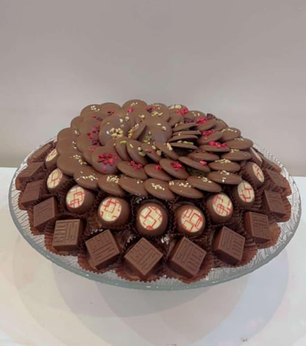 صحن شوكلاتة بلجيكية مكشوفة من 80 حبة الى 90شوكلاتة...