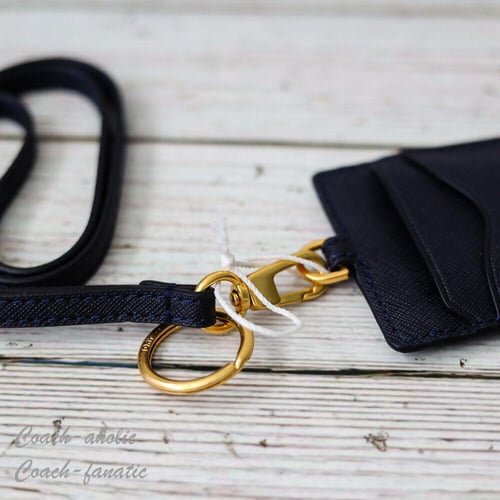 بطاقه تعريف توري بورش Tory Burch