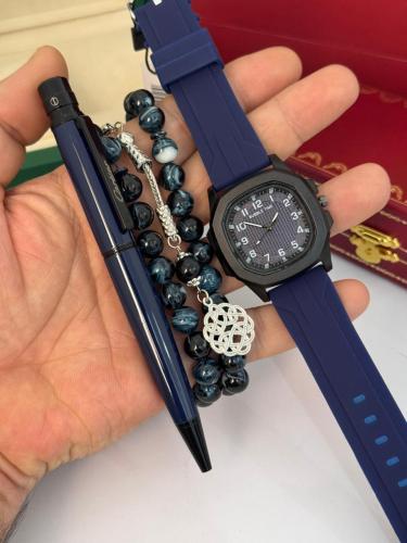 ساعة يد وقلم وسبحه