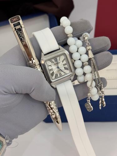 ساعة يد وقلم وسبحه