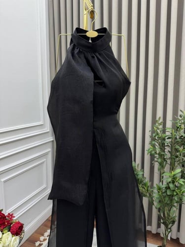 فستان عزيزه