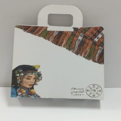 حامل هدية بشكل شنطة