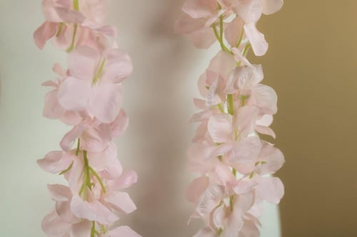 عقد ورد زهري مع اسم وسنه التخرج