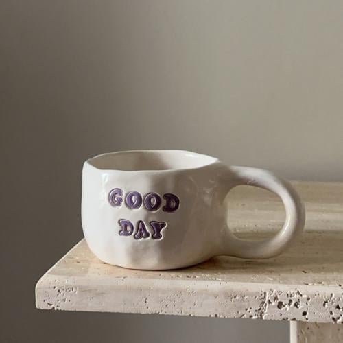 كوب فخار بعبارة good day