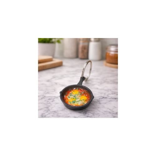 Miniature hand-made shakshuka with realistic detai...