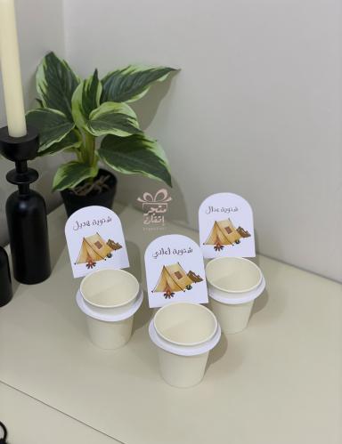 A 7-ounce size cup with a winter pendant with the...