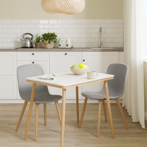 طاولة أنيقة بسطح رخامي أبيض وأرجل خشبية عصرية تناس...