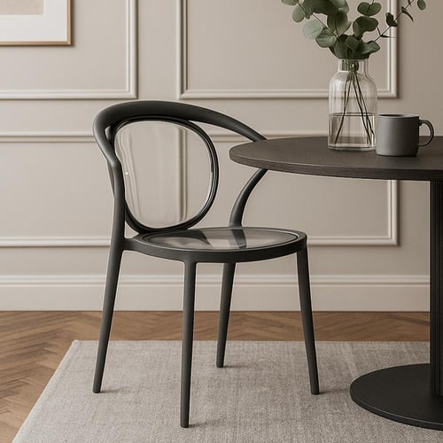 كرسي أنيق بتصميم عصري وظهر شفاف يضفي لمسة فريدة عل...