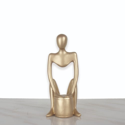 مجسم صغير ذهبي