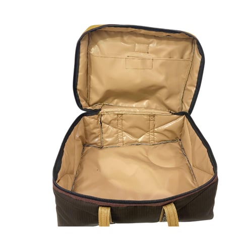 شنطة عزبة لون بني عودي كبيرة