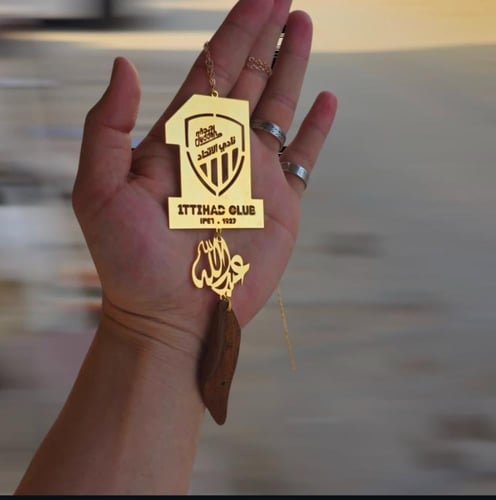 تعليقة شعار الاتحاد بالاسم وكسره العود