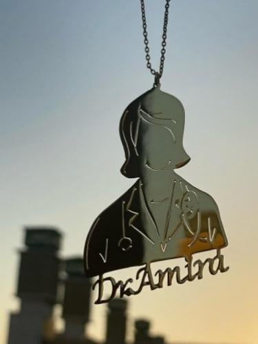 تعليقة شكل دكتوره