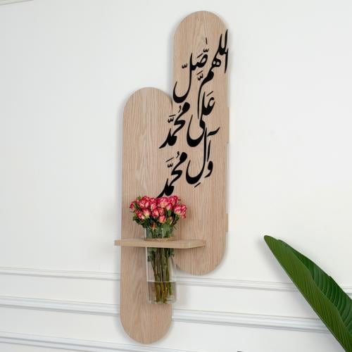 ديكور جداري وفازة + عبارة مميزة