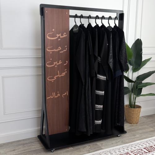 Clothes and abaya stand (black) + 7 spoons with na...