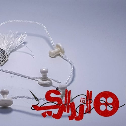 تركيبات عظم من ازراري لاناقة الثوب السعودي