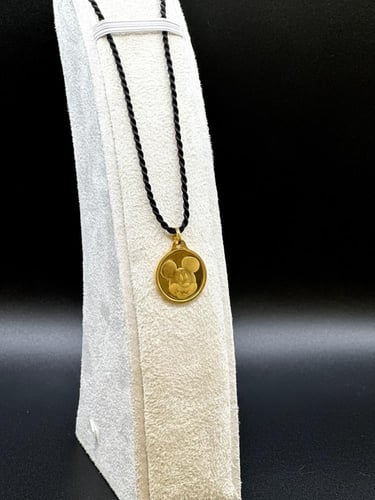 جنيه ذهب ميكي ماوس عيار 24 بي تي سي بوزن 8.35 غرام...