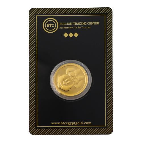 جنيه ذهب ميني ماوس عيار 24 بي تي سي بوزن 8 غرام