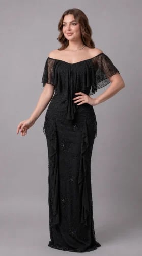 Long black evening dress decorated with beads and sequins