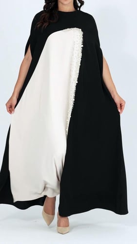 فستان سهرة طويل قماش كريب طايح اسود مع ابيض مزين ب...