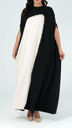 فستان سهرة طويل قماش كريب طايح اسود مع ابيض مزين ب...