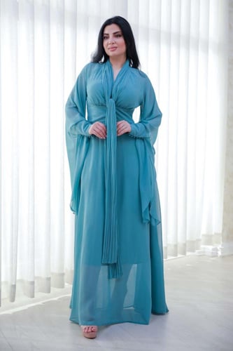 فستان طويل لون تيفاني قماش كريب شيفون بأكمام طويله...