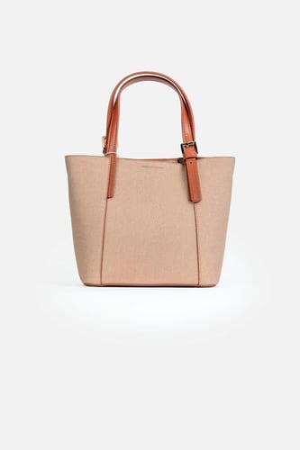 شنطة نسائية ماركة لورينا تعبر عن الأناقة بلون جملي