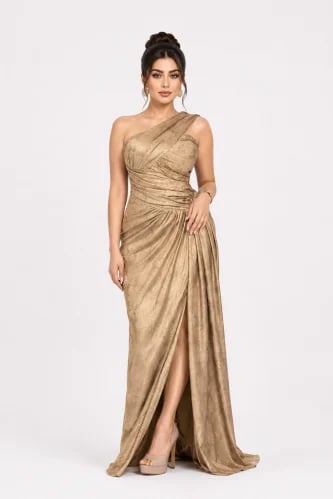 Long evening dress with a one-shoulder design and flowing draping
