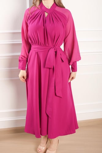 فستان فوشي كريب اكمام طويلة بتصميم مميز قطعة فاخرة