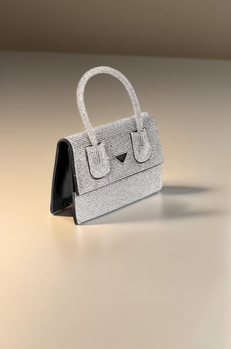 شنطة سهرة لون اسود مرصعة بفصوص زركون ابيض