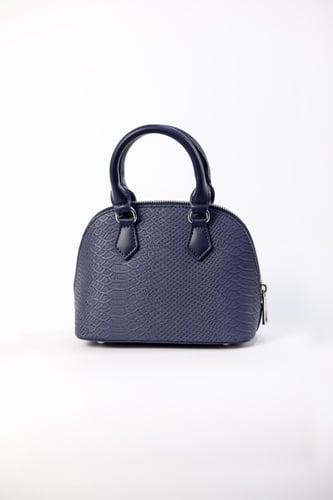 شنطة نسائي من الجلد الفاخر بتصميم عصري ومميز من ما...