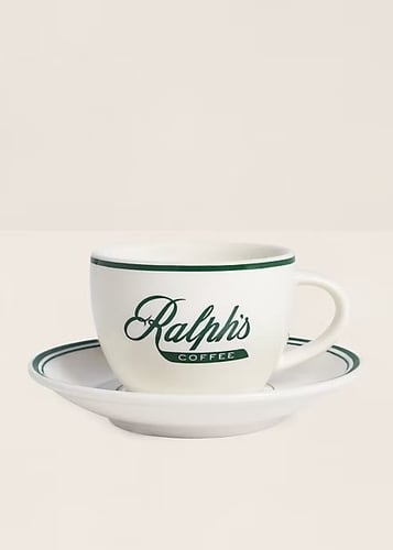 فنجان قهوة وطبق برسمة Ralph’s Coffee