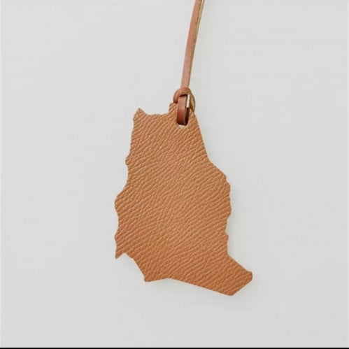 تعليقه شعار المملكه العربيه السعوديه باللون البني