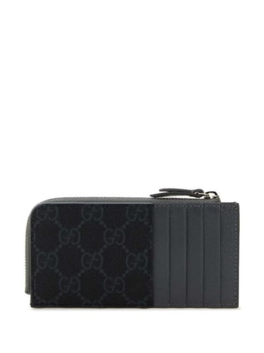 محفظة قوتشي